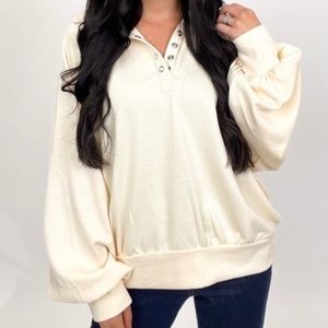 Bibi size medium women’s pullover, color is oatmeal